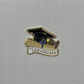 Graduation-themed metal sticker with cap and scroll on a gray background for laptop and phone cases