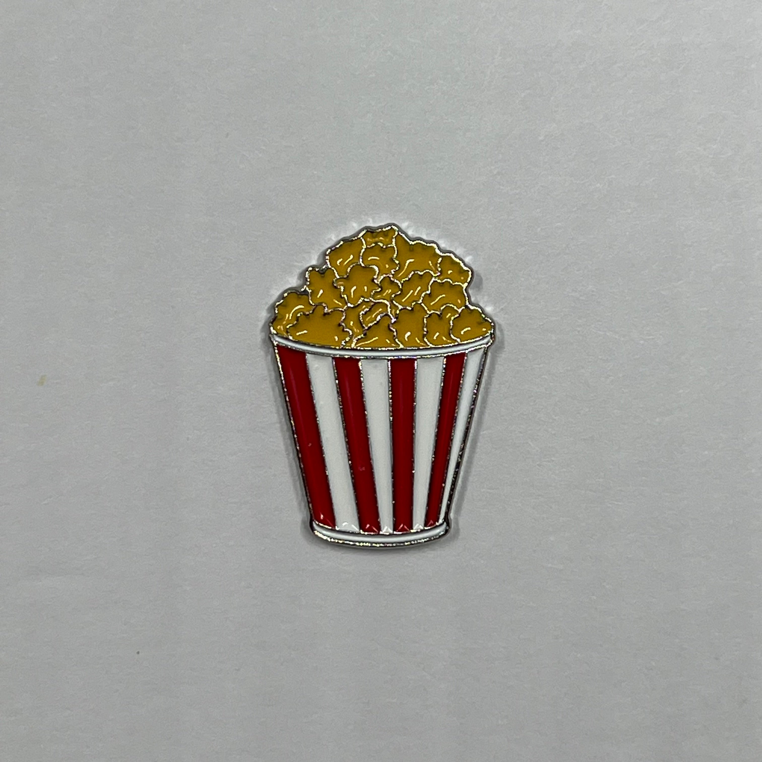 popcorn metal sticker with red and white striped bucket