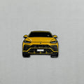 yellow sports car metal sticker front view