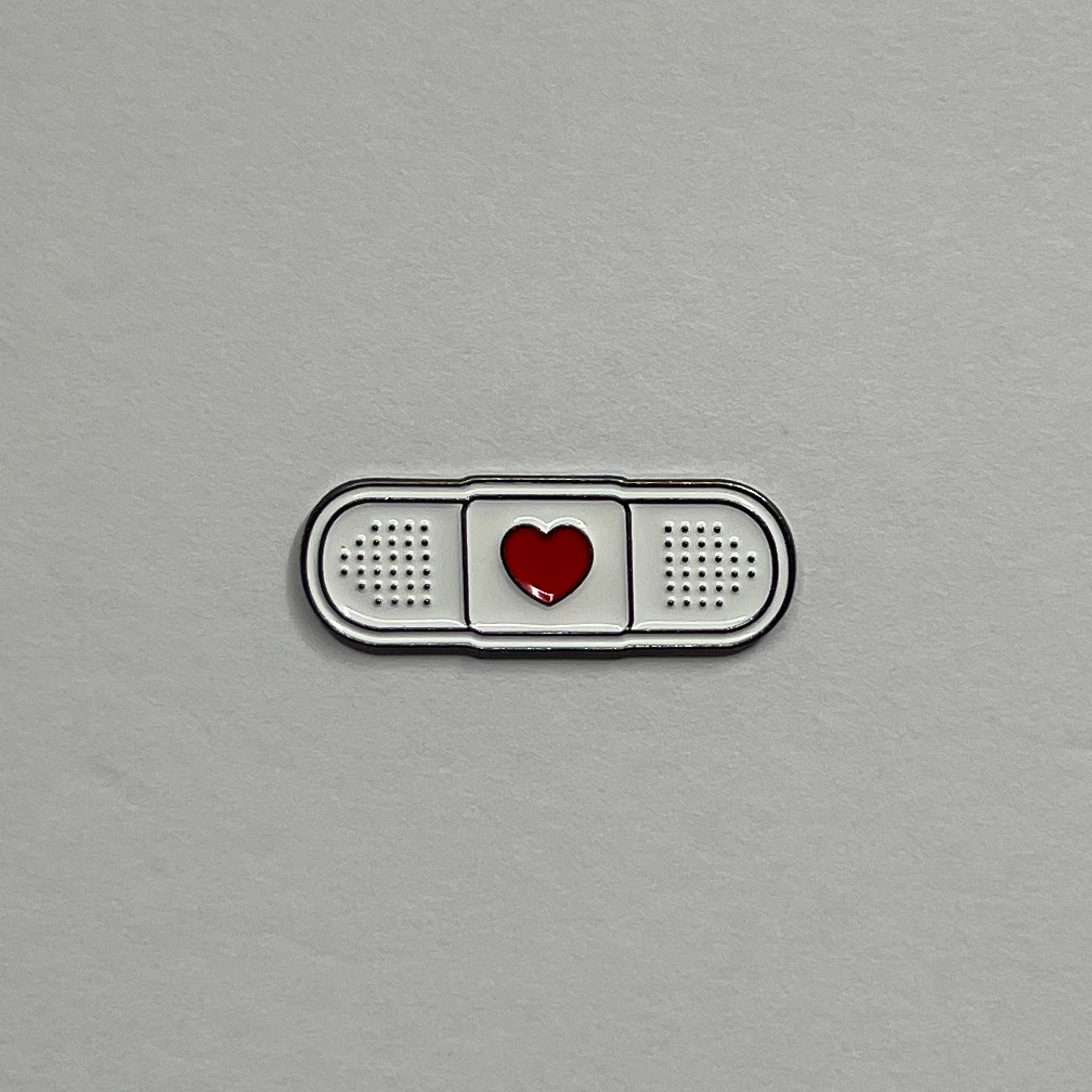 Heart aid metal sticker