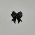 Black bow metal sticker