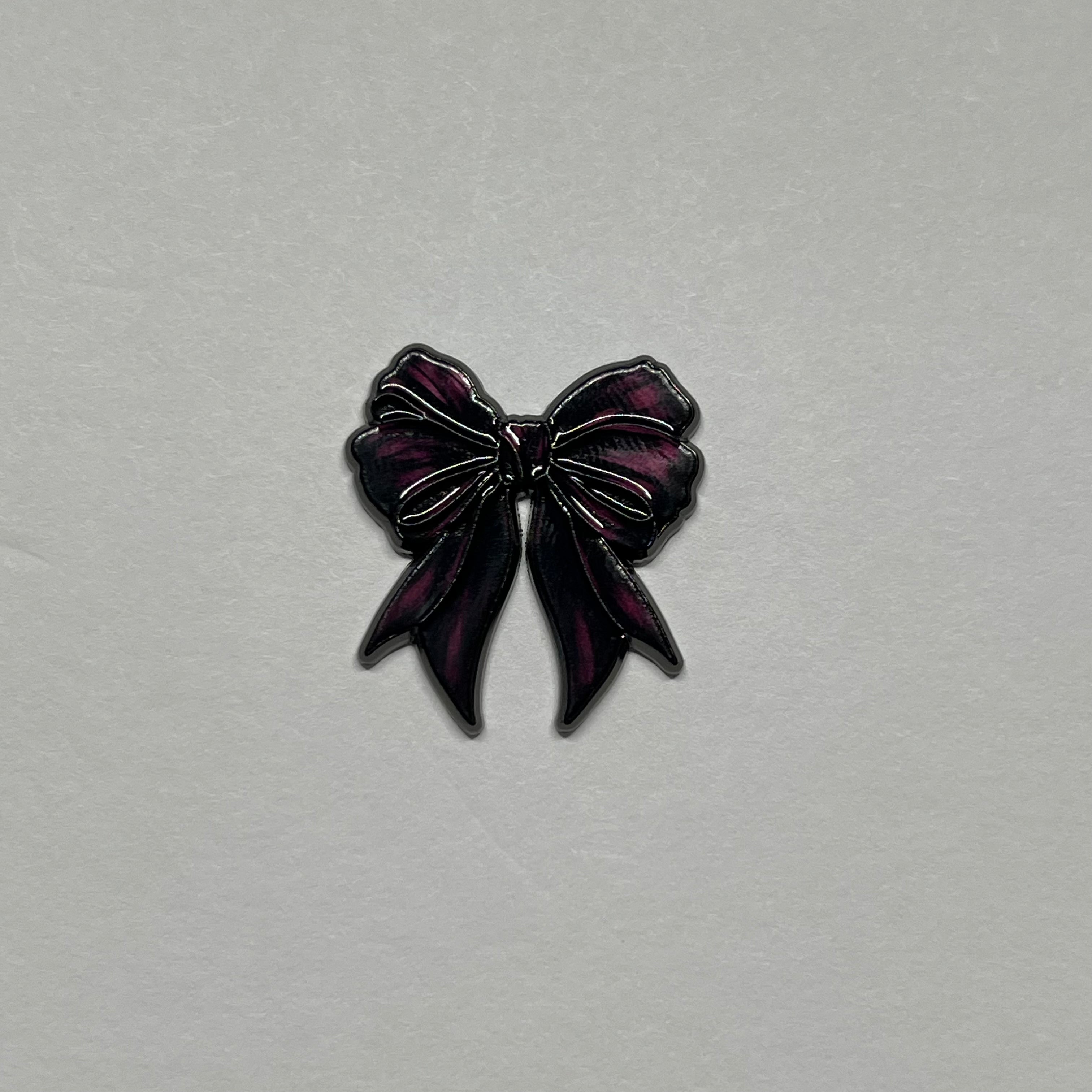 Black bow metal sticker