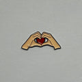 Heart hand metal sticker